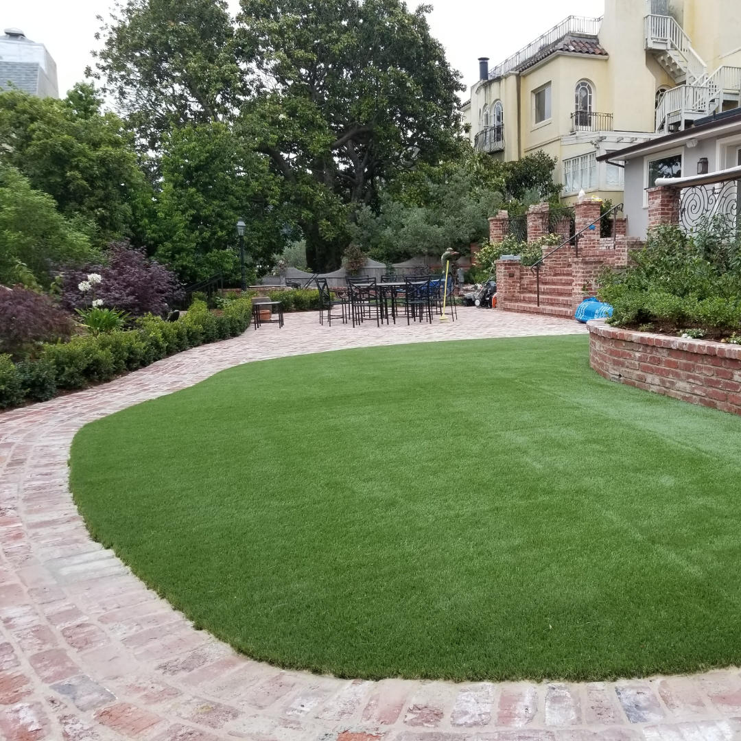 Artificial Grass and Stone Patio