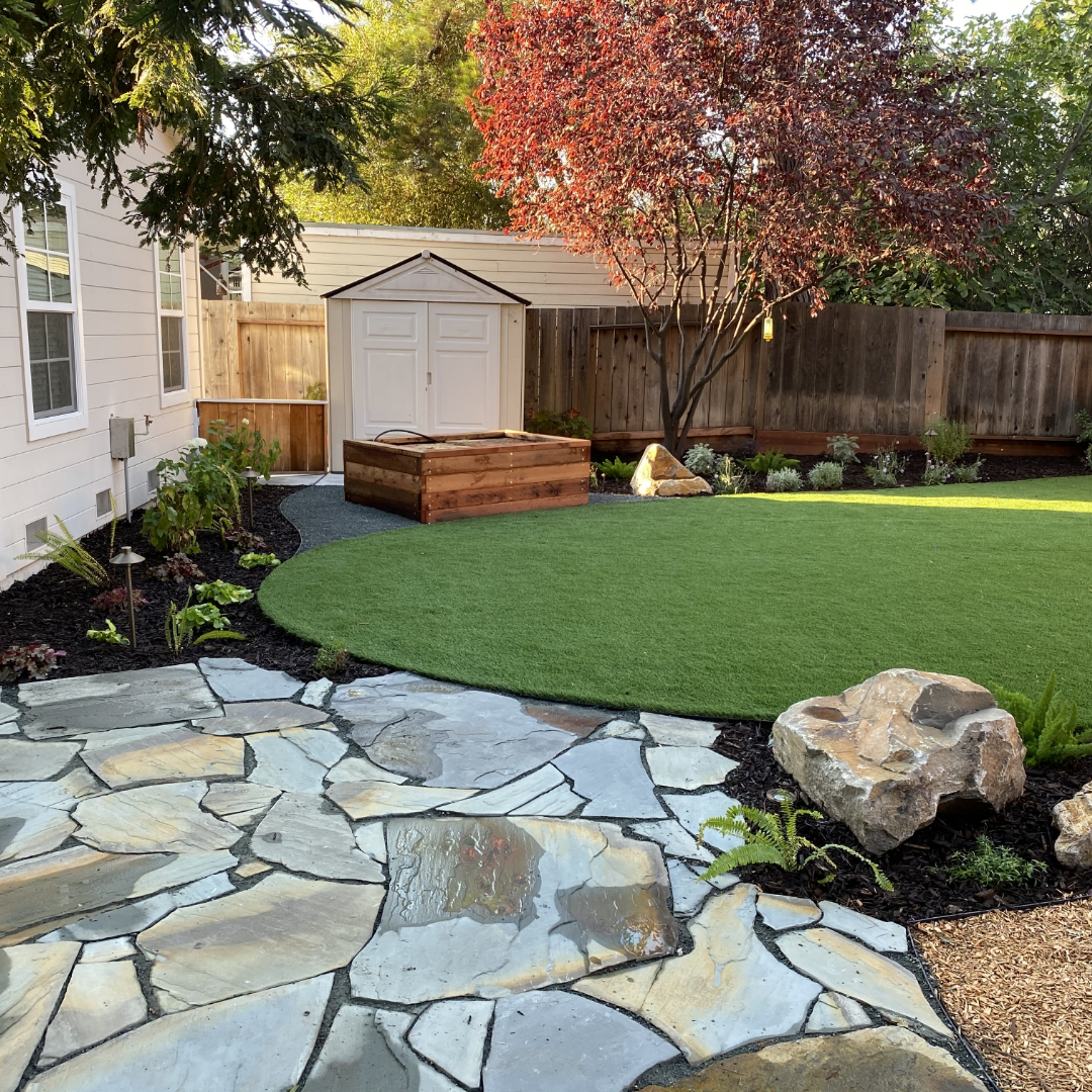Artificial Grass and Stone Walkway